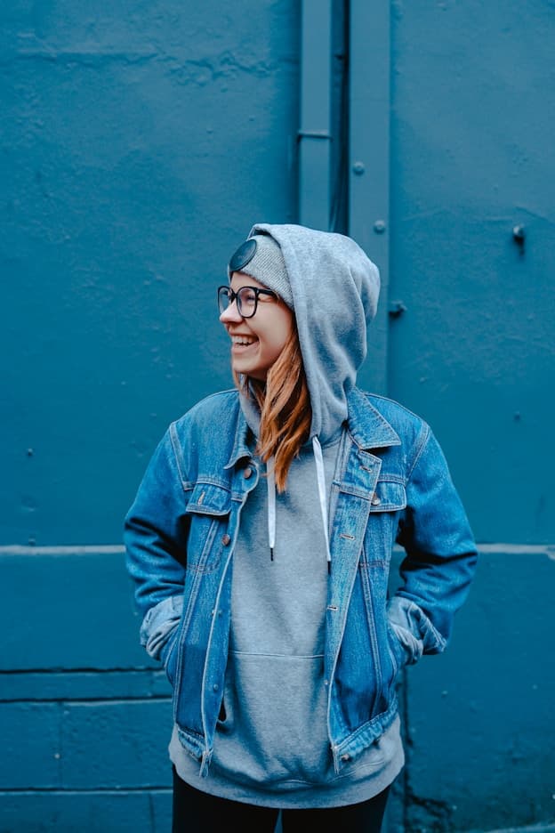 Young person smiling outdoors